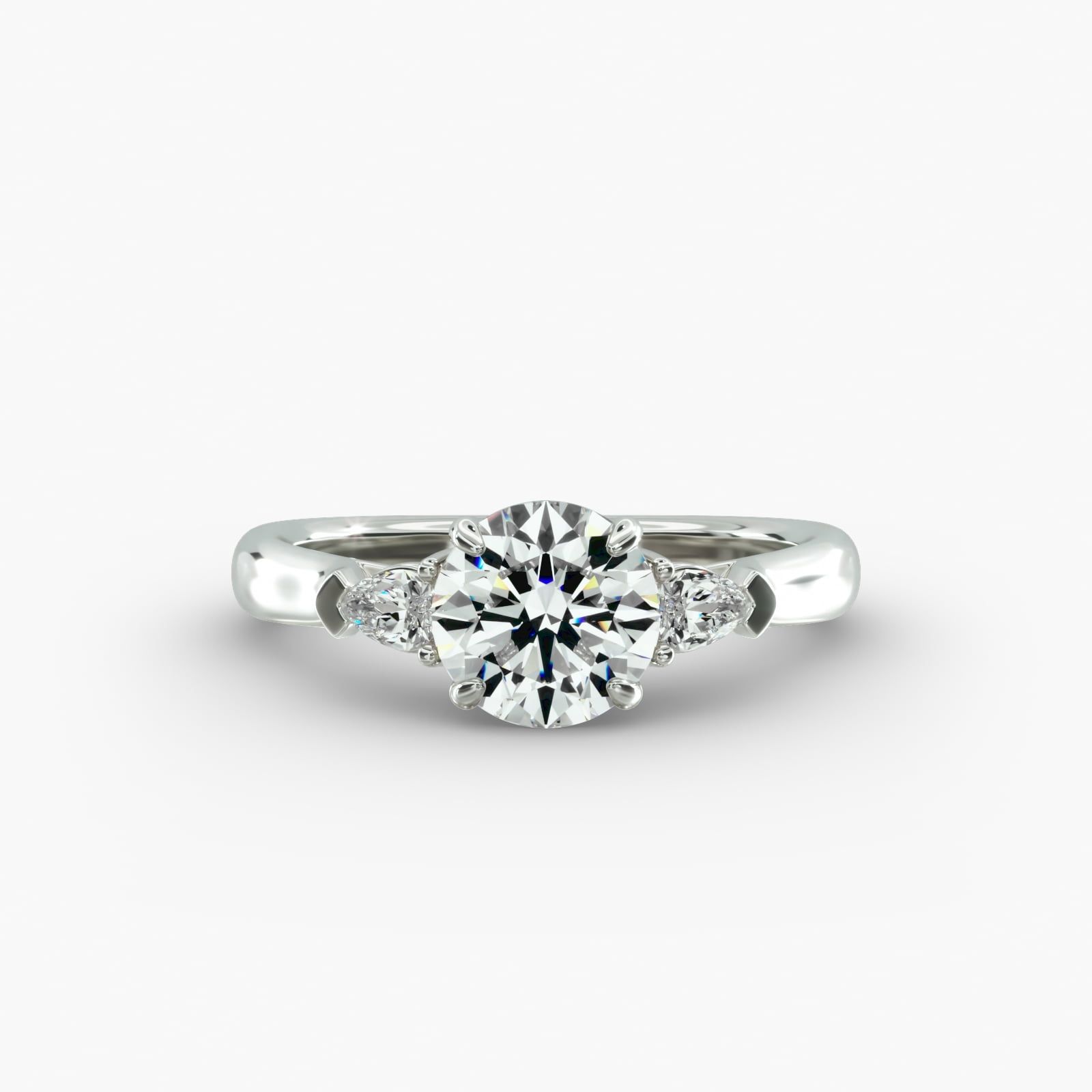 Pear Shaped 3 Stone Engagement Ring with Side Diamonds