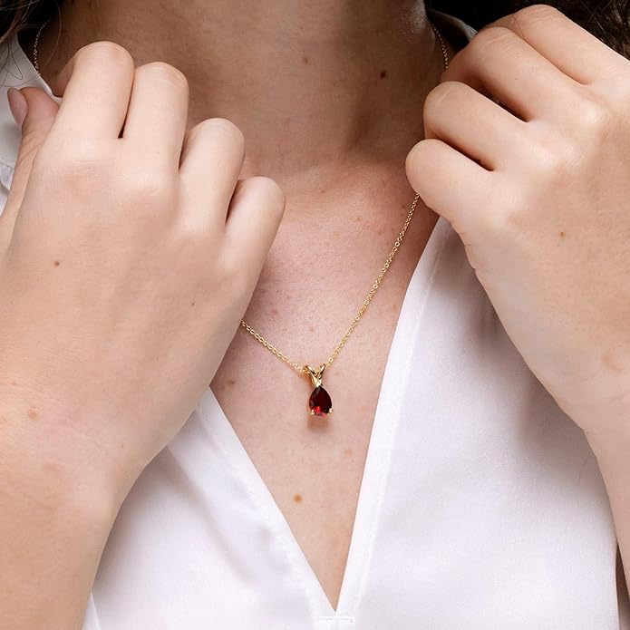 classic-garnet-4 Elegant pear-shaped garnet solitaire pendant in silver, gold, or platinum. Perfect January birthstone gift for birthdays, anniversaries, or weddings.