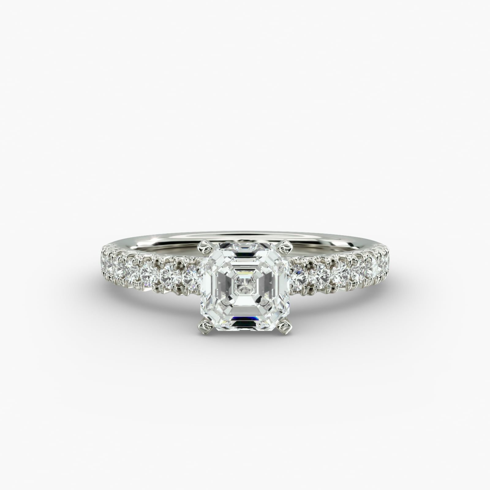 asscher kite with prongs on sides 1 Discover the elegant asscher kite with prongs on sides ring in 14K white gold, featuring 16 round diamonds in a stunning pave setting.