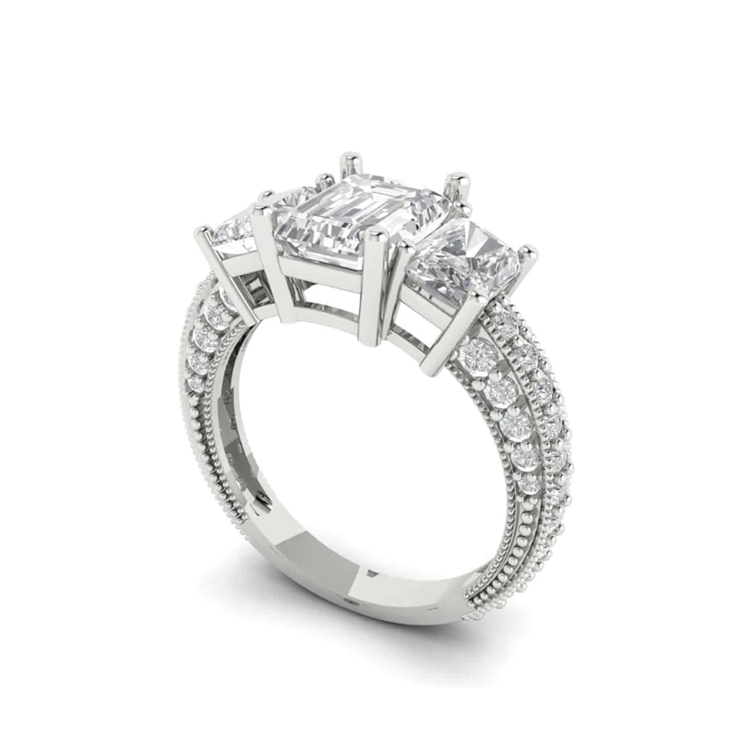 Elegant 18K white gold solitaire ring with 3-stone accents from Clara Pucci. Perfect for bridal, engagement, or statement wear.