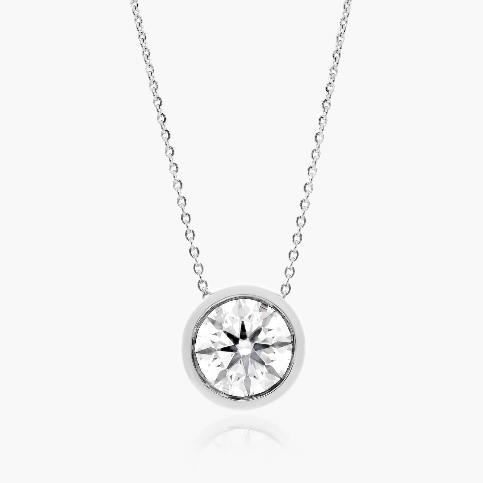 James Allen 14K White Gold Bezel Diamond Pendant (0.50 CTW) A 0.50 CTW diamond appears to float in a secure 14K white gold bezel setting. Adjustable 16-18" chain.