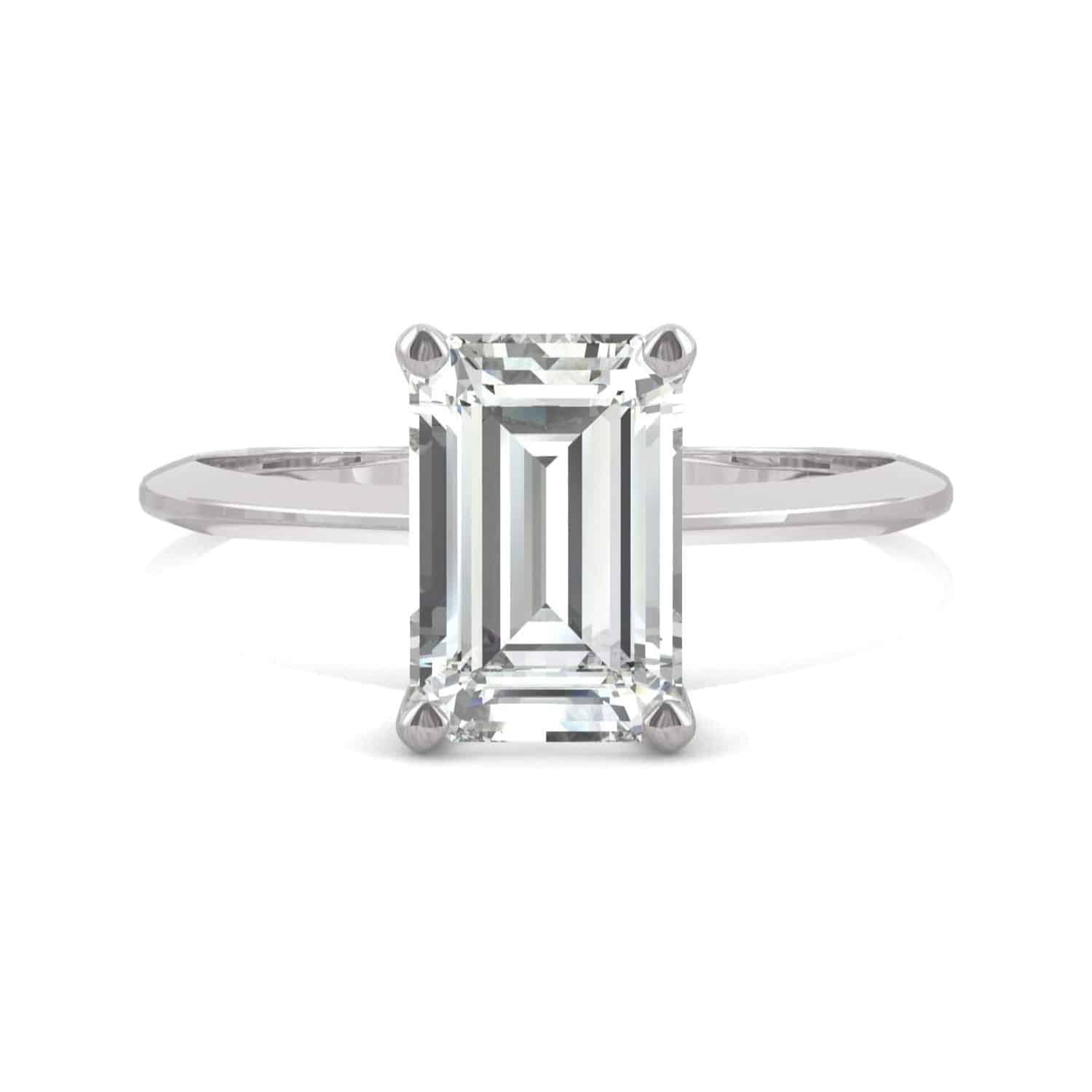 emerald-cut-moissanite-ring-1 Elegant 2.52 cttw DEW emerald cut moissanite engagement ring by Charles & Colvard in 14k white gold. Lab-grown and warrantied