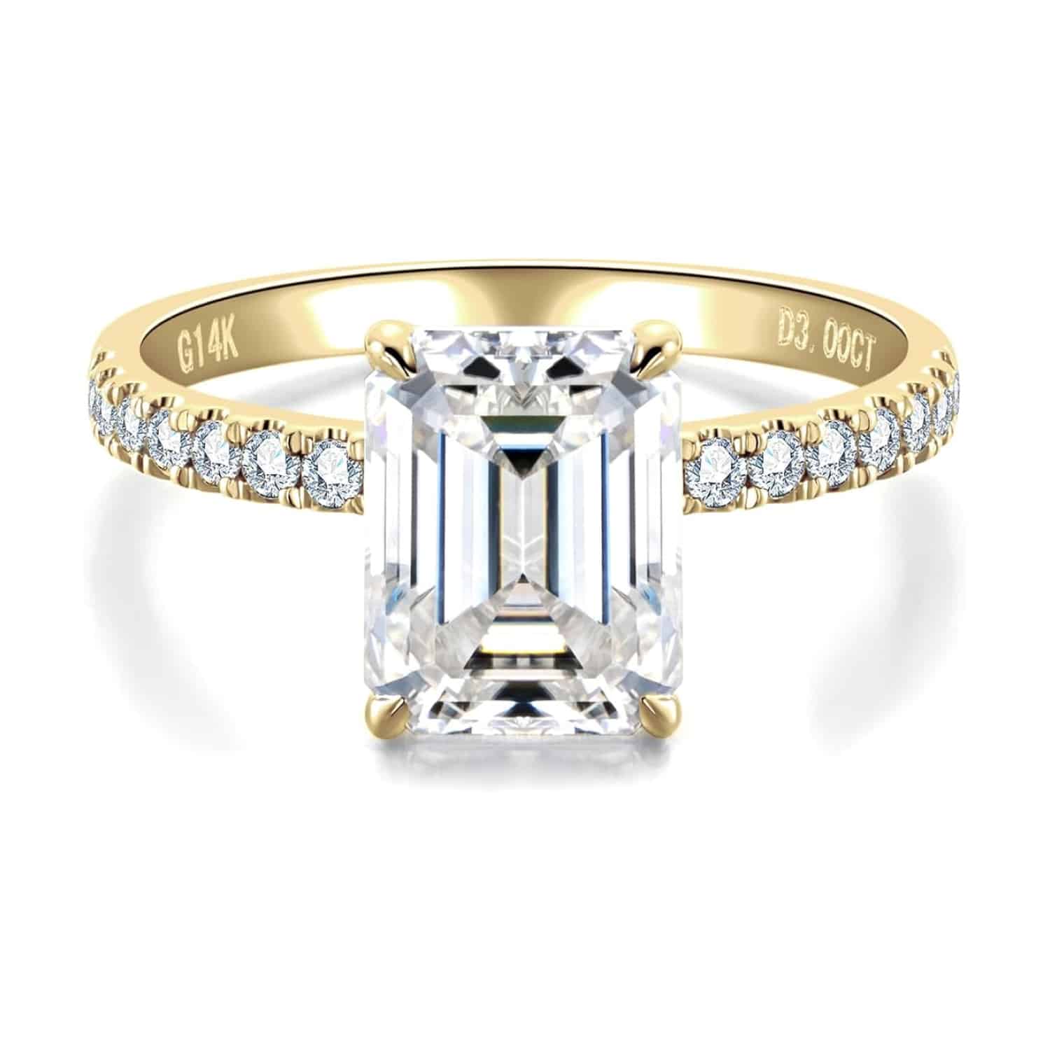 emerald-cut-moissanite-ring-3 Elegant 3 carat emerald cut moissanite ring with side stones in 14K solid gold from CADYNO. Perfect for weddings & anniversaries.