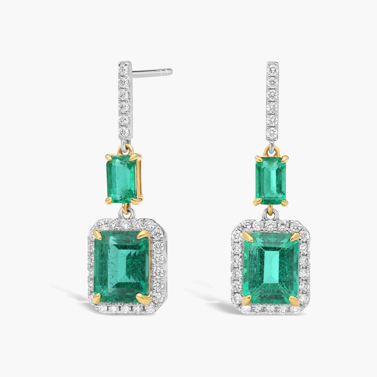 Cascade Emerald and Diamond Drop Earrings 1 A stunning cascade of vibrant green emeralds and brilliant diamonds, expertly set in luxurious 18k yellow and white gold.