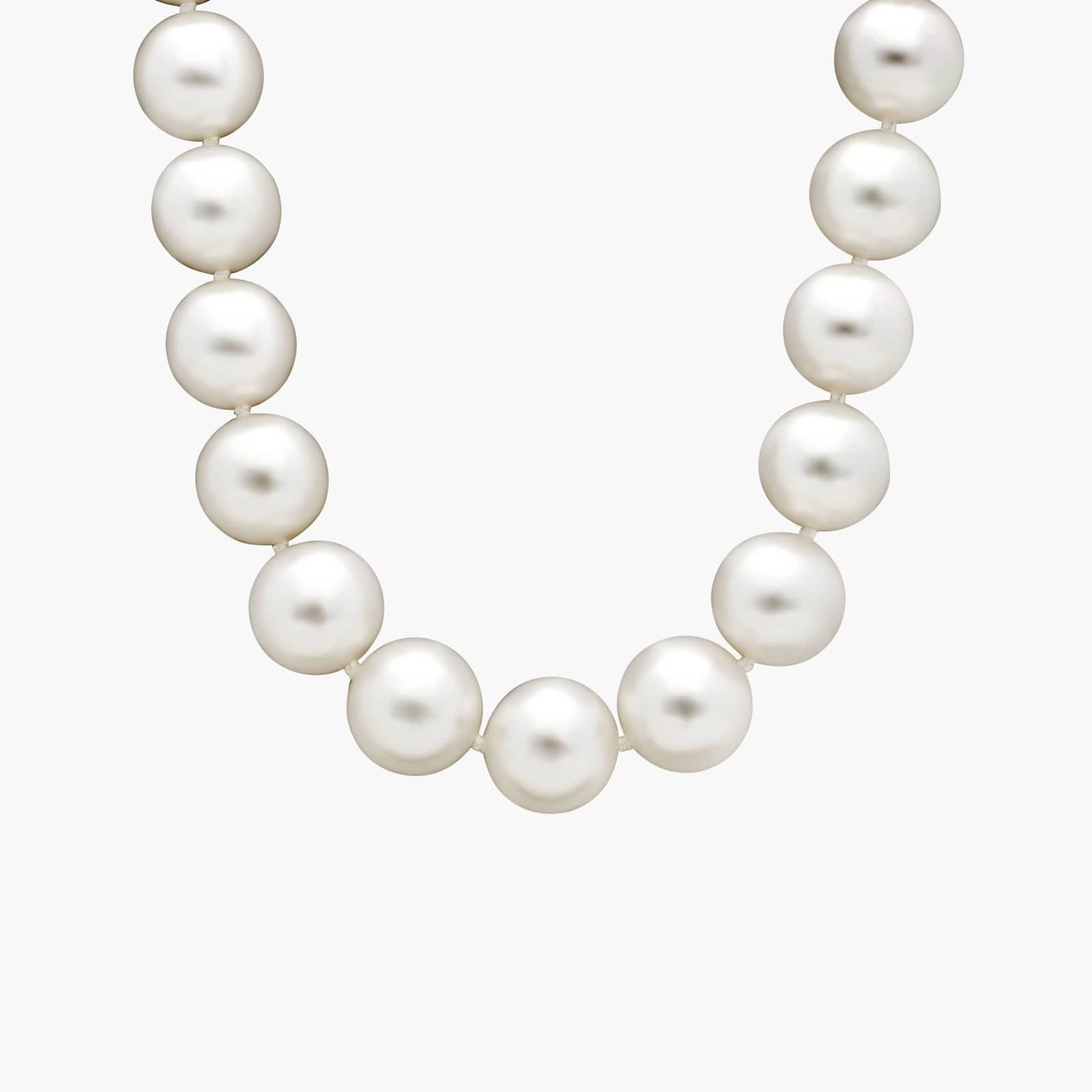 Luminous South Sea Pearl Strand Necklace 1 An exquisite 17-inch strand of exceptionally large and luminous South Sea cultured pearls, hand-knotted and secured with an 18k white gold safety clasp.