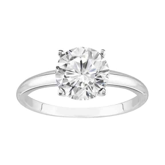 A classic 4-prong solitaire lab-grown diamond engagement ring, showcasing its IGI-certified round brilliant cut diamond in a 14k white gold setting on a plain background.