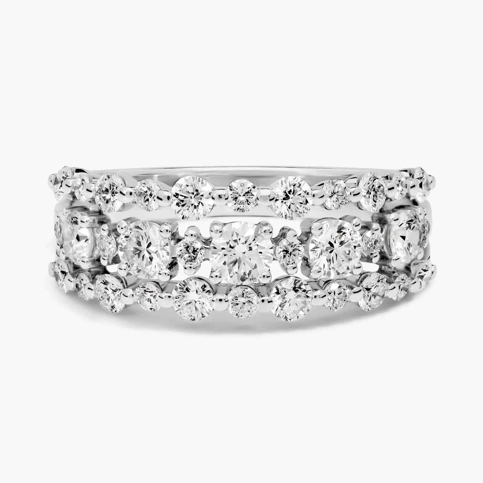 Diamond Three-Row Alternating Fashion Ring in 14k White Gold A 1-carat three-row diamond fashion ring in 14k white gold, featuring 33 brilliant round diamonds prong-set to create a wide, sparkling band, shown on a white background.