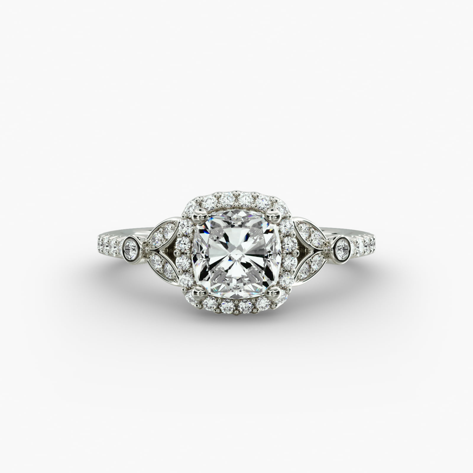 GIA 1.50 Ct Cushion Diamond Petite Pavé Leaf Halo Engagement Ring A high-resolution studio image of a GIA 1.50 carat cushion modified diamond engagement ring on a white background, highlighting the Ideal Cut and the intricate details of the halo and pavé setting.