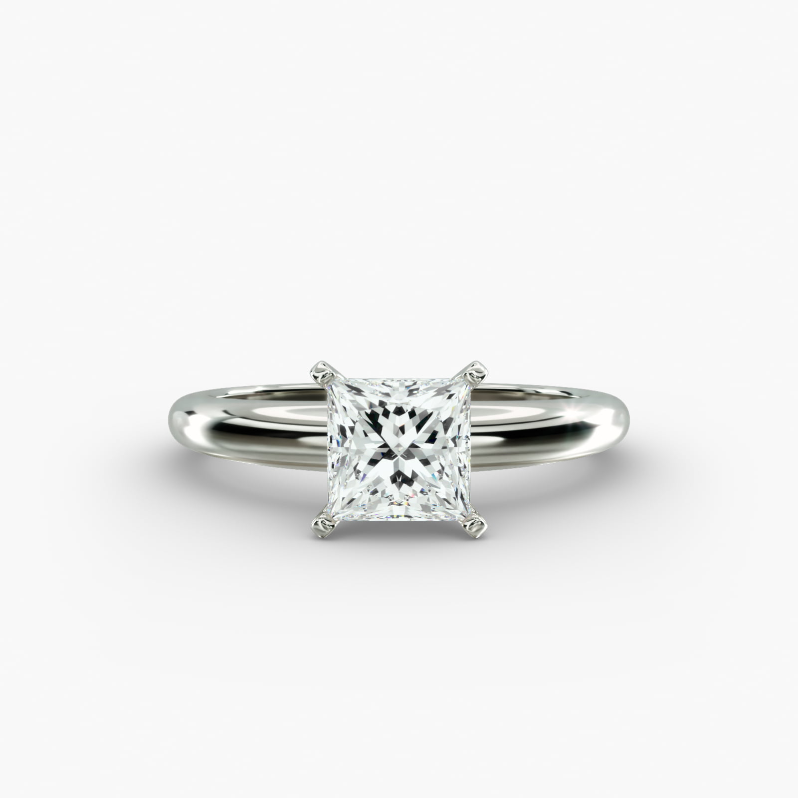 Classic Solitaire 2 Carat Princess Cut Lab-Grown Diamond Engagement Ring in 14k White Gold A close-up side view of a simple solitaire 2 carat princess cut lab-grown diamond engagement ring, highlighting the stone's setting in 14k white gold.