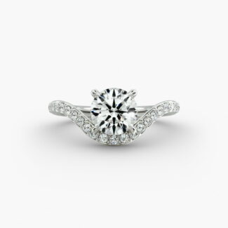 A close-up view of a 4 carat round diamond ring, highlighting the Triple Excellent cut of the lab-grown stone and the sparkling pavé setting.