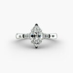 A close-up view of a marquise diamond ring with pear-shaped accents, highlighting the elongated 2.21 ratio and IF clarity.