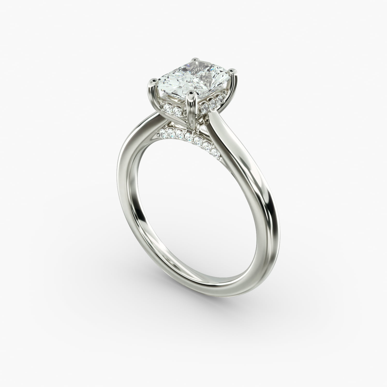 A close-up side view of a 6 ct radiant cut diamond ring, showcasing the delicate 1.60mm band and the hidden halo accent diamonds.