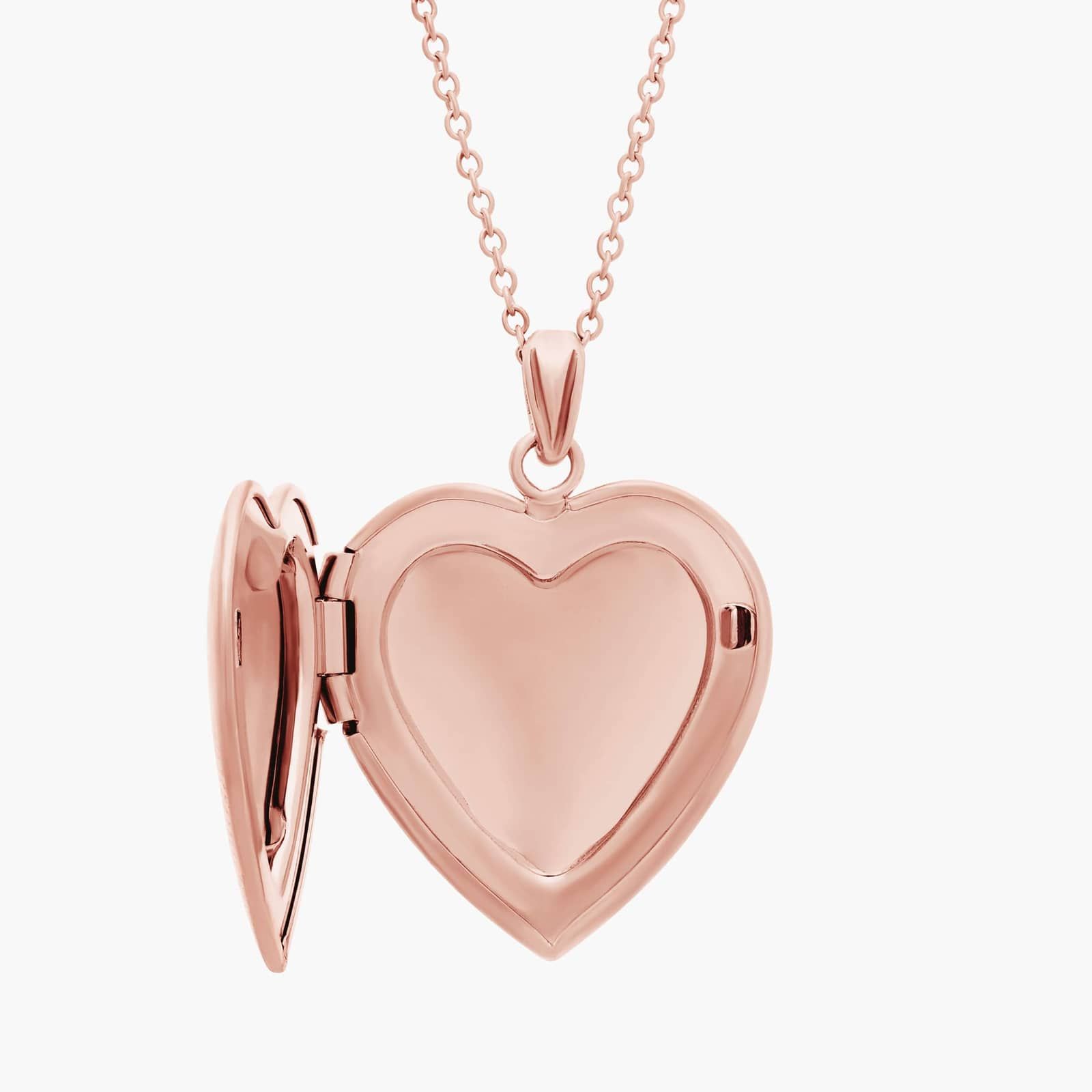 A closed 18-inch Sweetheart Locket with a single diamond accent in 14K Rose Gold, a romantic example of Luxury Push Present Ideas for a new mother.