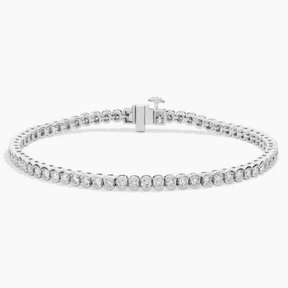 A Lab-Grown Diamond Bezel and Prong Tennis Bracelet (2 3/4 CTW) in 14K White Gold, a high-value option for Luxury Push Present Ideas.