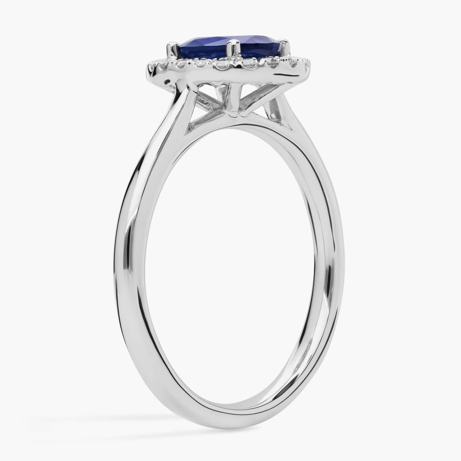 A Floating Oval Sapphire and Diamond Micropavé Halo Ring (7x5mm sapphire, 0.14 CTW diamond) in 14K White Gold, a colorful and elegant option among Luxury Push Present Ideas.