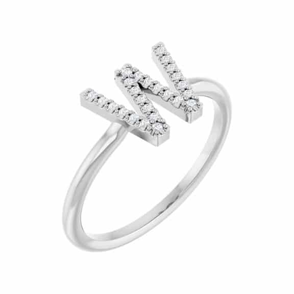 A personalized Diamond Initial Ring in solid Platinum with 0.06 CTW of natural diamonds, an enduring and luxurious choice among Luxury Push Present Ideas and push present ring options.