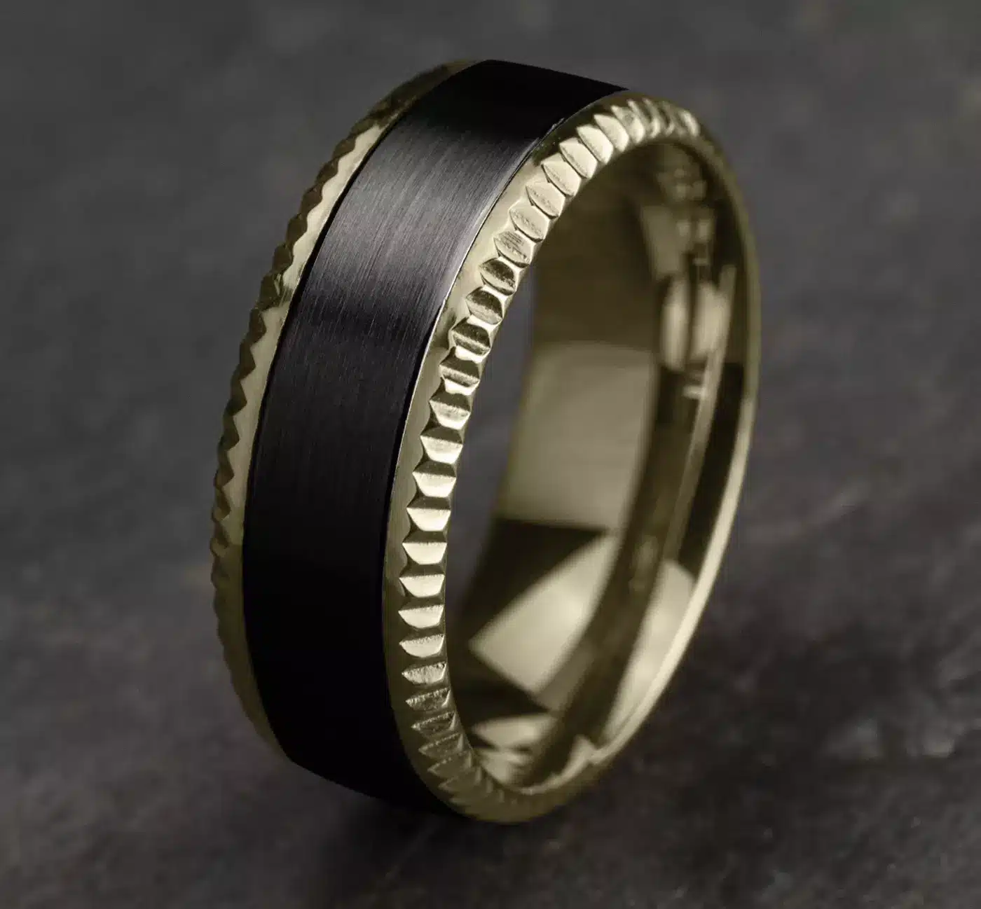 bastion-fluted-bevel-black-titanium-mens-black-gold-wedding-bands-8mm 4 A Bastion Fluted Bevel Black Titanium and 14K Yellow Gold Mens Black Gold Wedding Bands style (8.00mm) with a brushed black center and polished gold edges.