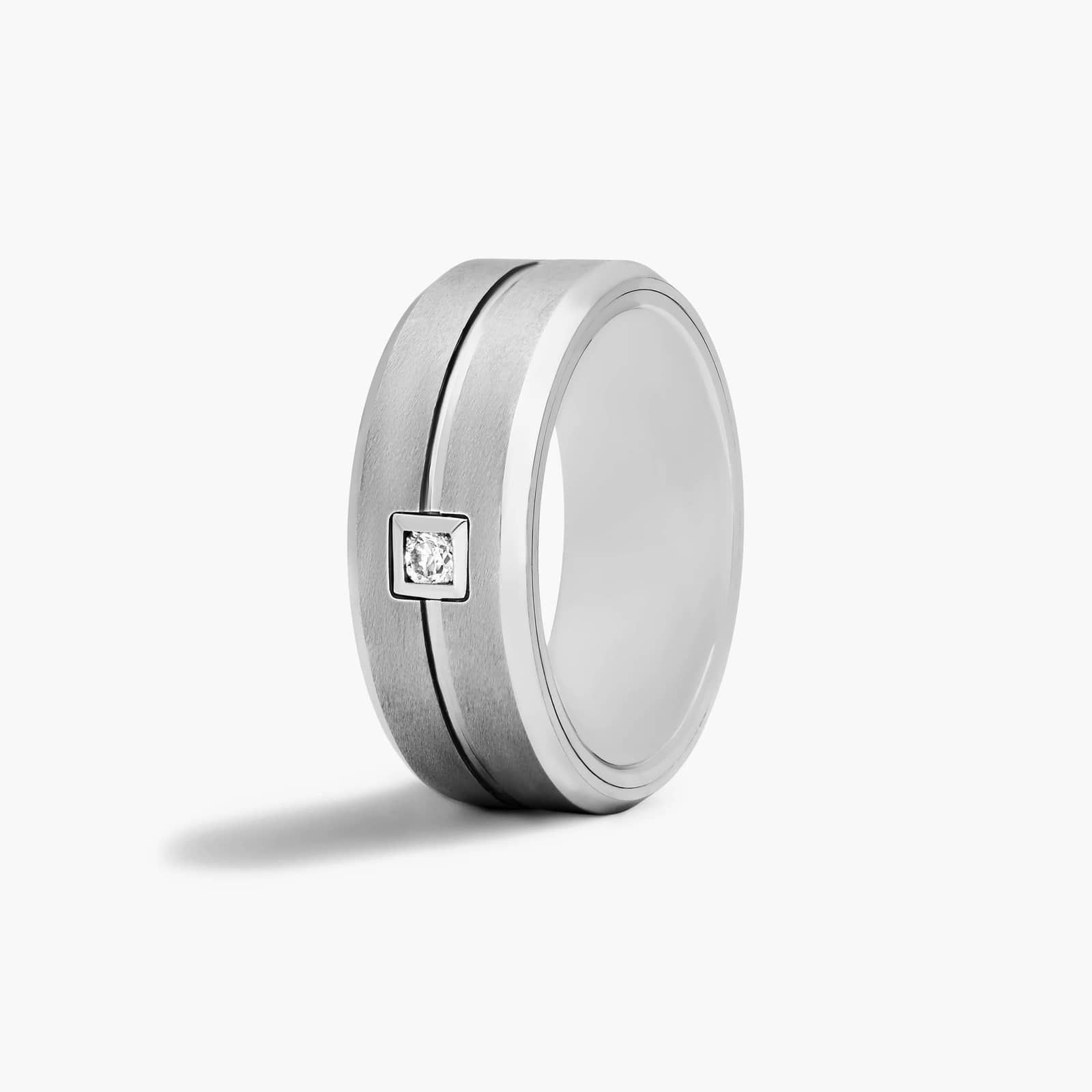mens-tungsten-wedding-bands-with-diamonds-round-cut-9mm 2 A Round Cut Diamond Mens Tungsten Wedding Bands With Diamonds by TRITON (9.00mm) in White Tungsten Carbide with a 0.1 CTW diamond.