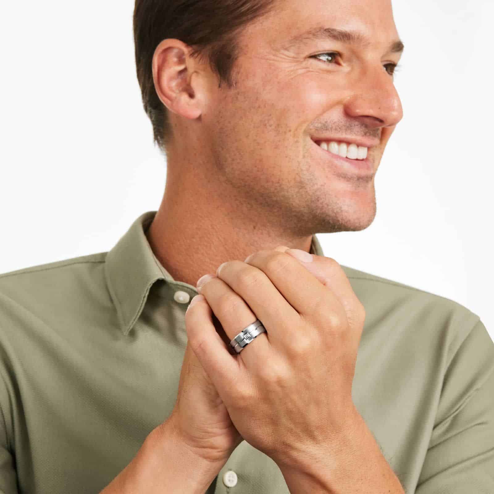 mens-tungsten-wedding-bands-with-diamonds-round-cut-9mm model view 2 A Round Cut Diamond Mens Tungsten Wedding Bands With Diamonds by TRITON (9.00mm) in White Tungsten Carbide with a 0.1 CTW diamond.