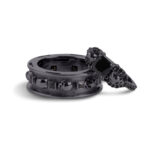 A set of Black Wedding Ring Sets His and Hers featuring a Princess Cut Black Moissanite Skull Engagement Ring and matching wedding band in 925 Sterling Silver with a Gun Metal finish.