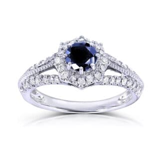 A 14K White Gold Art Deco Vintage Sapphire Rings engagement ring featuring a 0.7 Carat Round Natural Blue Sapphire center, a 0.3 CTW diamond Halo, and vintage detailing (1.0 CTW total).