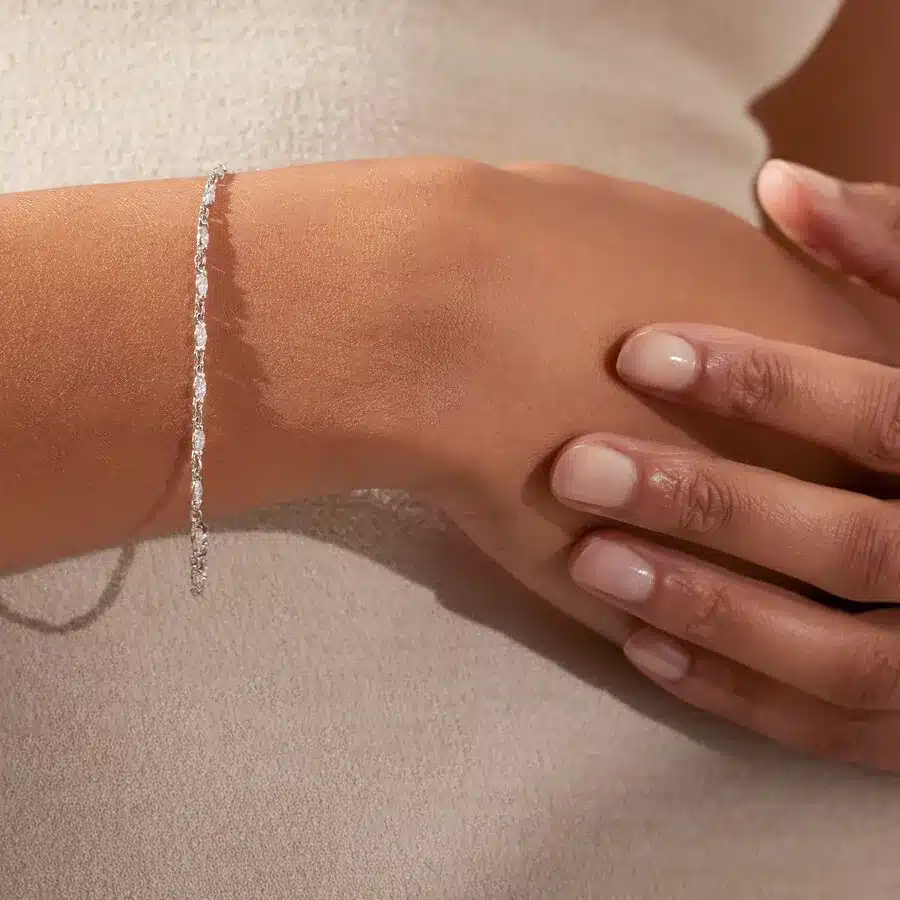 Platinum marquise lab grown diamond tennis bracelets under $3000 featuring 1.71 CTW of marquise diamonds and an engravable medallion.