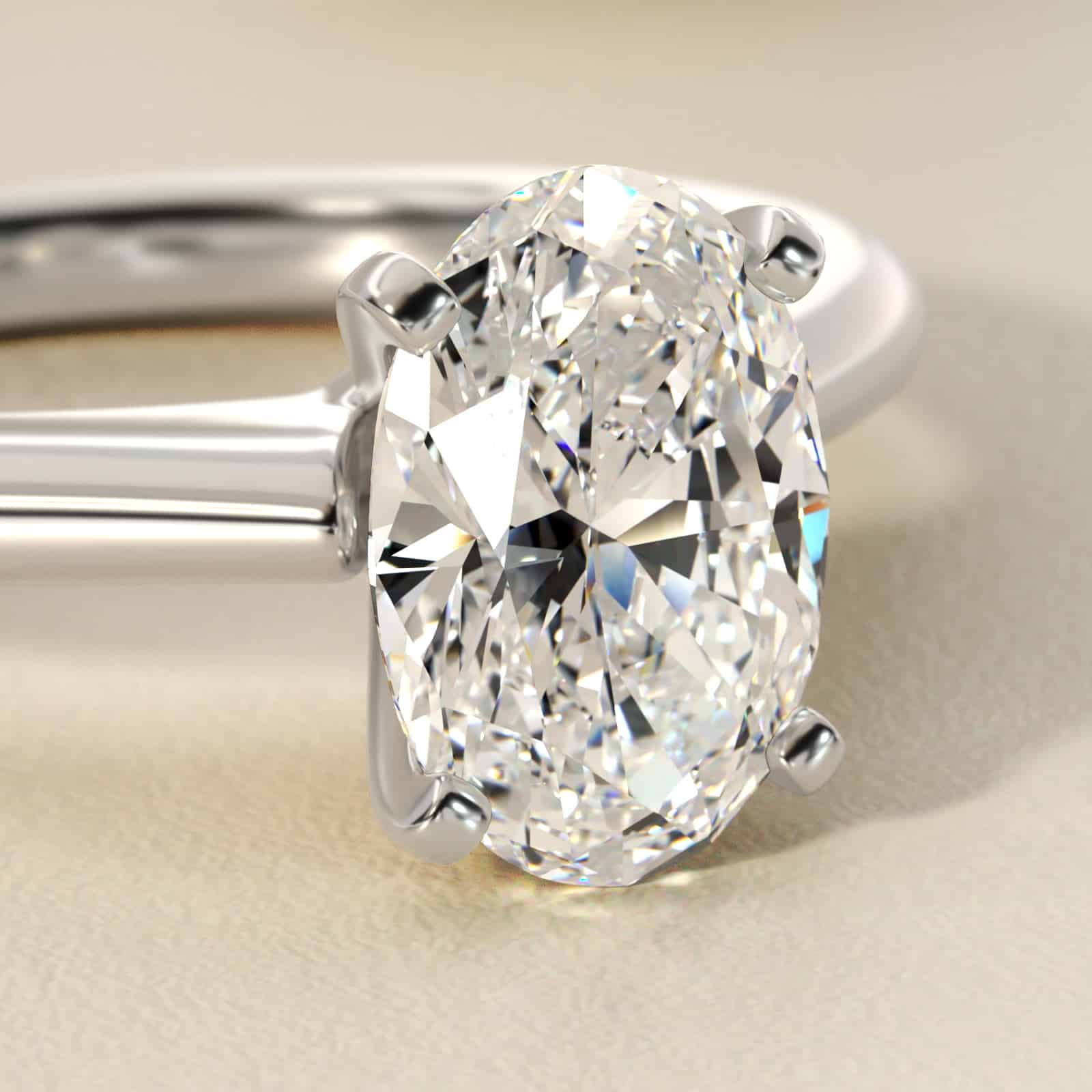 Oval Cut 1.5 CT Certified Lab-Grown Diamond Petite Solitaire Engagement Ring In Platinum 2 Platinum oval solitaire engagement rings under $2,500 featuring a 1.5 carat oval lab-grown diamond on a 1.80mm petite band.