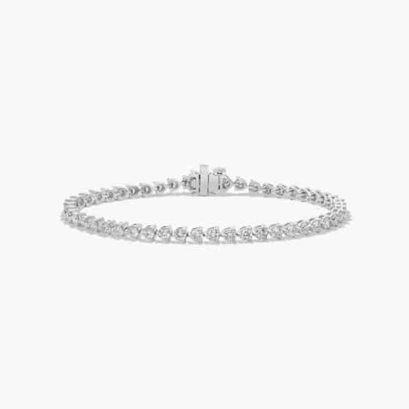 14K white gold round lab grown diamond tennis bracelets under $3000 featuring 4 CTW of brilliant diamonds and a floral box clasp.