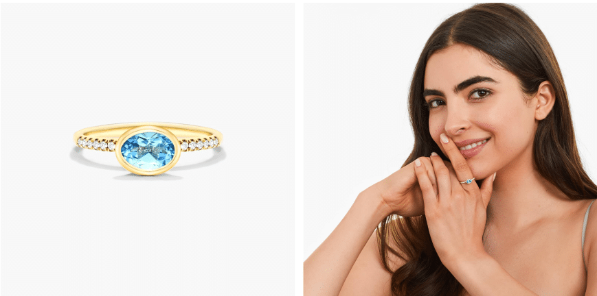 East-West Oval Blue Topaz And Diamond Ring In 18K Yellow Gold