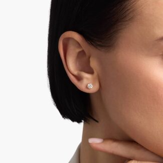 Enhance your everyday elegance with our stunning 1 ct total weight diamond earrings, featuring two brilliant round natural diamonds set in classic 14K yellow gold with secure Guardian backs.