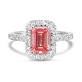 Experience breathtaking brilliance with this 2.50 CTW pink diamond emerald cut engagement rings style statement piece, featuring IGI certified lab-grown diamonds set in luminous 14k white gold.