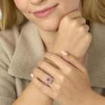 Experience breathtaking brilliance with this 2.50 CTW pink diamond emerald cut engagement rings style statement piece, featuring IGI certified lab-grown diamonds set in luminous 14k white gold.
