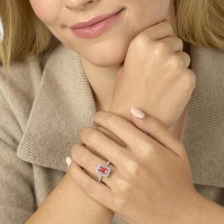 Experience breathtaking brilliance with this 2.50 CTW pink diamond emerald cut engagement rings style statement piece, featuring IGI certified lab-grown diamonds set in luminous 14k white gold.