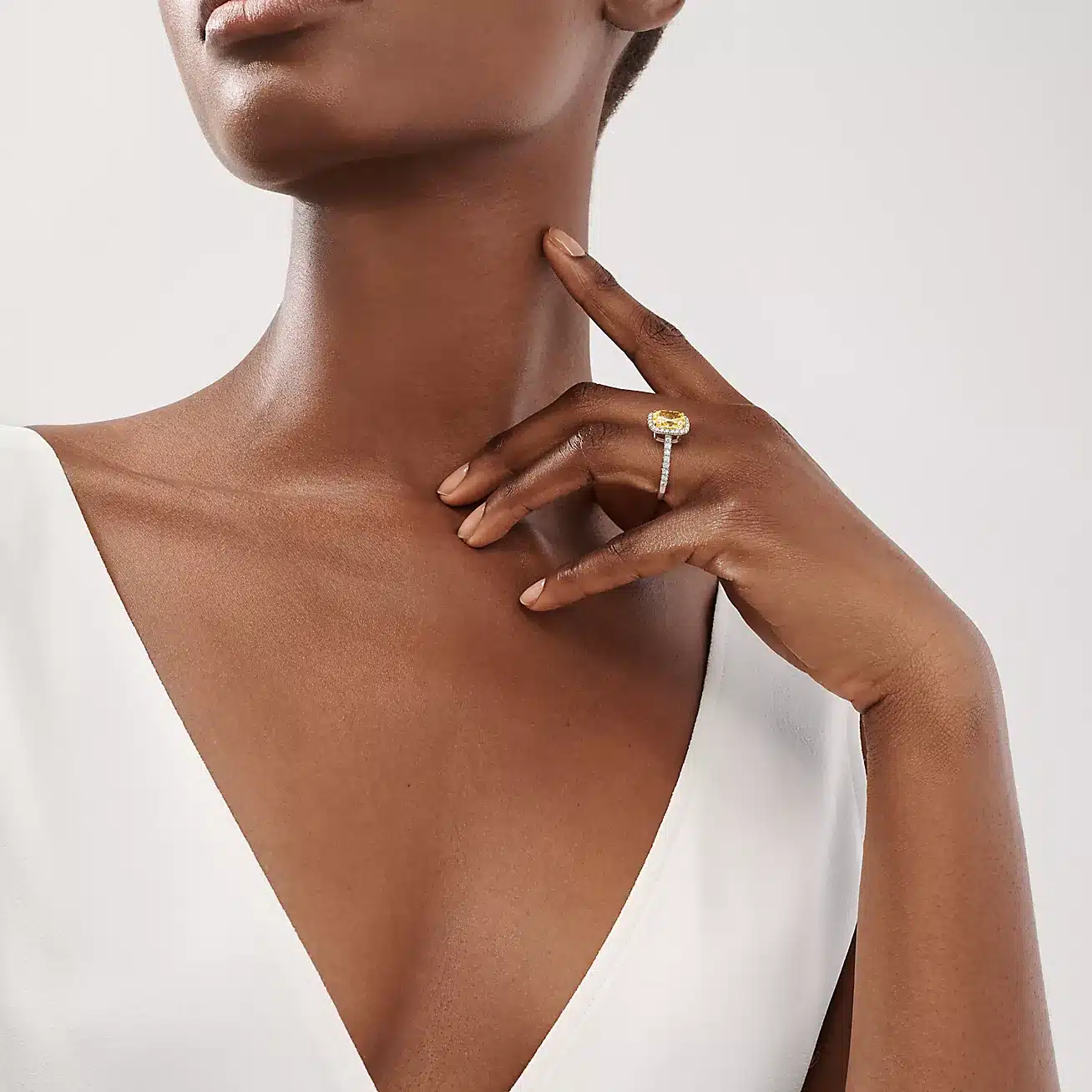 Discover the tiffany and co yellow diamond engagement ring from the Soleste collection. 2.00 carat Fancy Vivid Yellow cushion-cut diamond set in platinum.