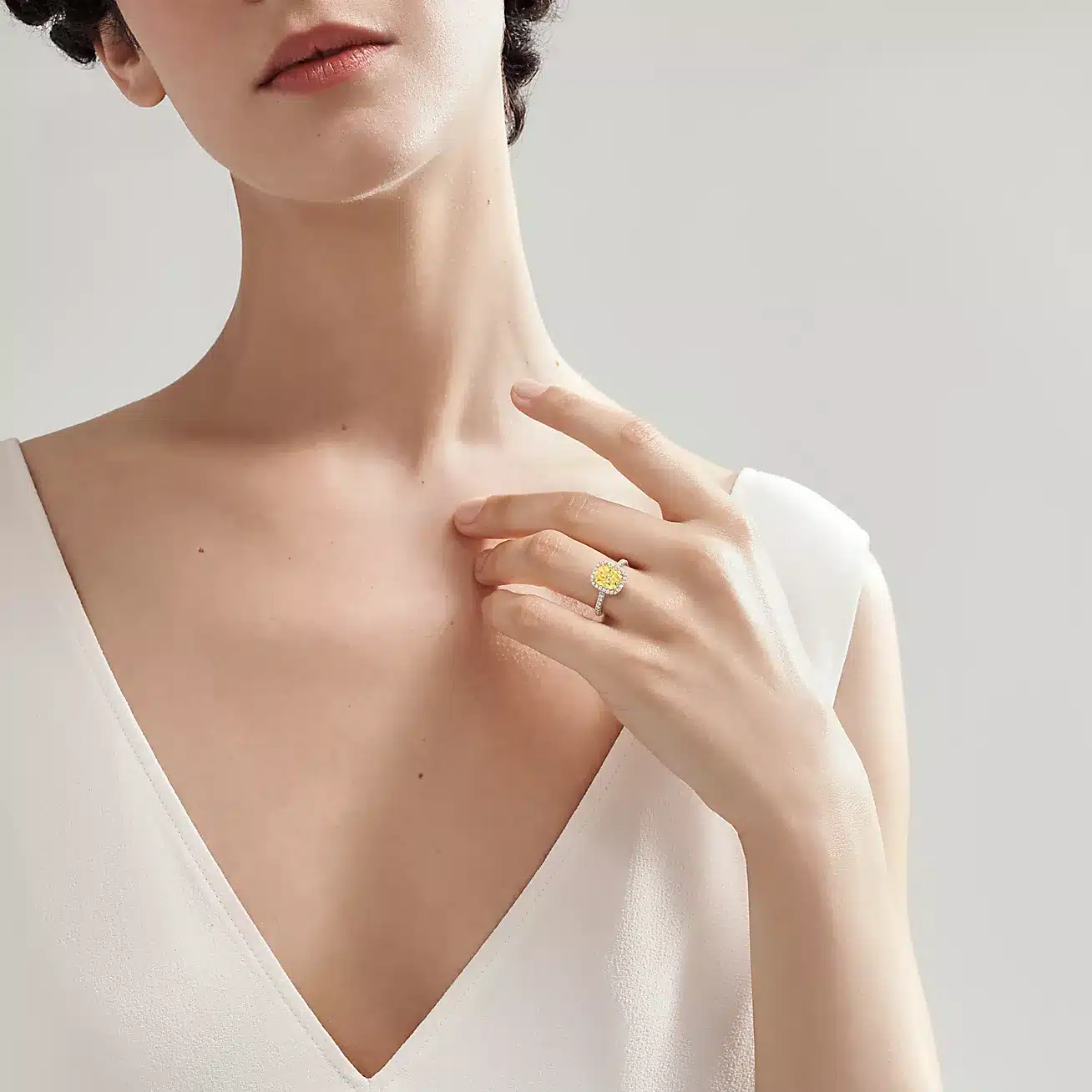 Discover the tiffany and co yellow diamond engagement ring from the Soleste collection. 2.00 carat Fancy Vivid Yellow cushion-cut diamond set in platinum.