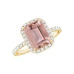 Experience timeless romance with this stunning emerald cut morganite engagement ring, featuring a 2.3ct AAA natural morganite centerpiece surrounded by a brilliant 0.42ct diamond halo set in 14K yellow gold.