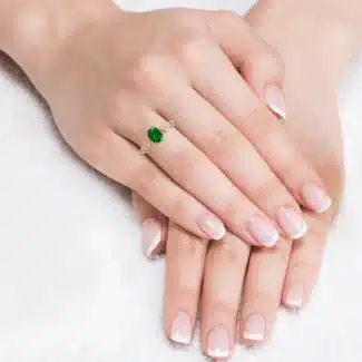 Shop our exclusive rose gold emerald engagement rings. This 0.85 cts AAAA quality natural emerald solitaire in 14k rose gold is handcrafted in the USA.