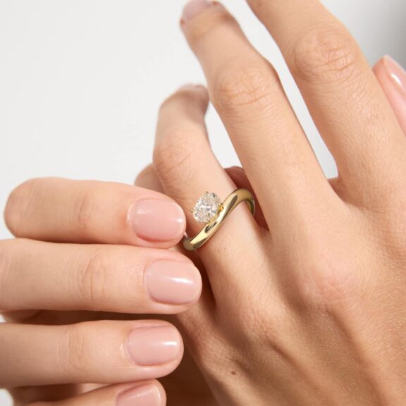 Sculptural Waves Diamond Solitaire Engagement Ring in 14K Yellow Gold with Claw Prong Set Diamond 